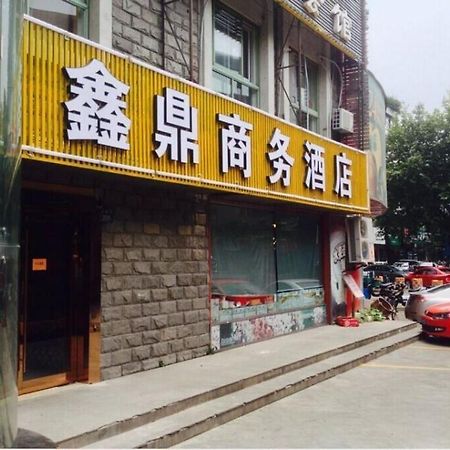 Xinding Business Hotel Hangzhou Extérieur photo