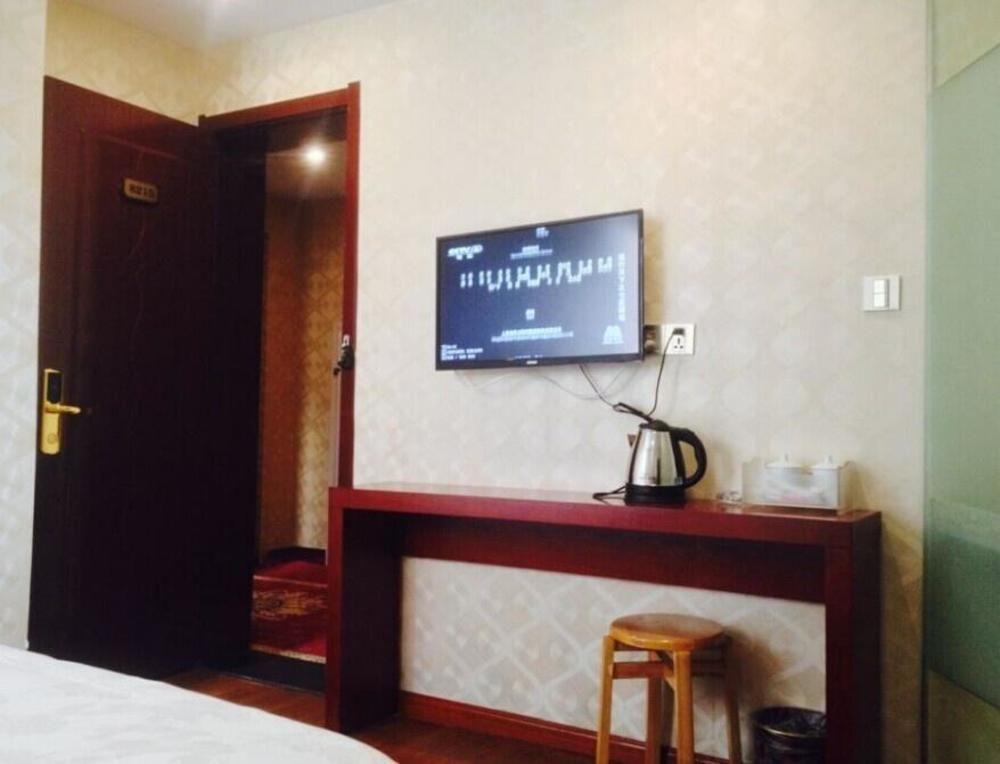 Xinding Business Hotel Hangzhou Extérieur photo