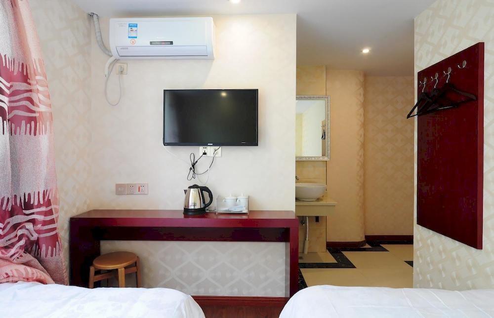 Xinding Business Hotel Hangzhou Extérieur photo